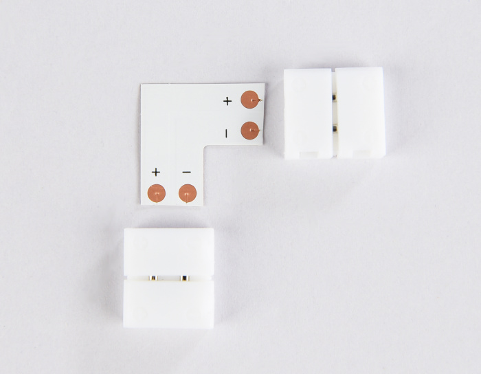 Соединитель угловой L для светодиодной ленты 5050 12/24V (2 конт.) GS6551 (10шт) Ambrella light GS6551